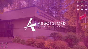 YT Cover - SBO - 2022 - PINK Picture of Abbotsford School Board office with pink overlay and logo in the middle
